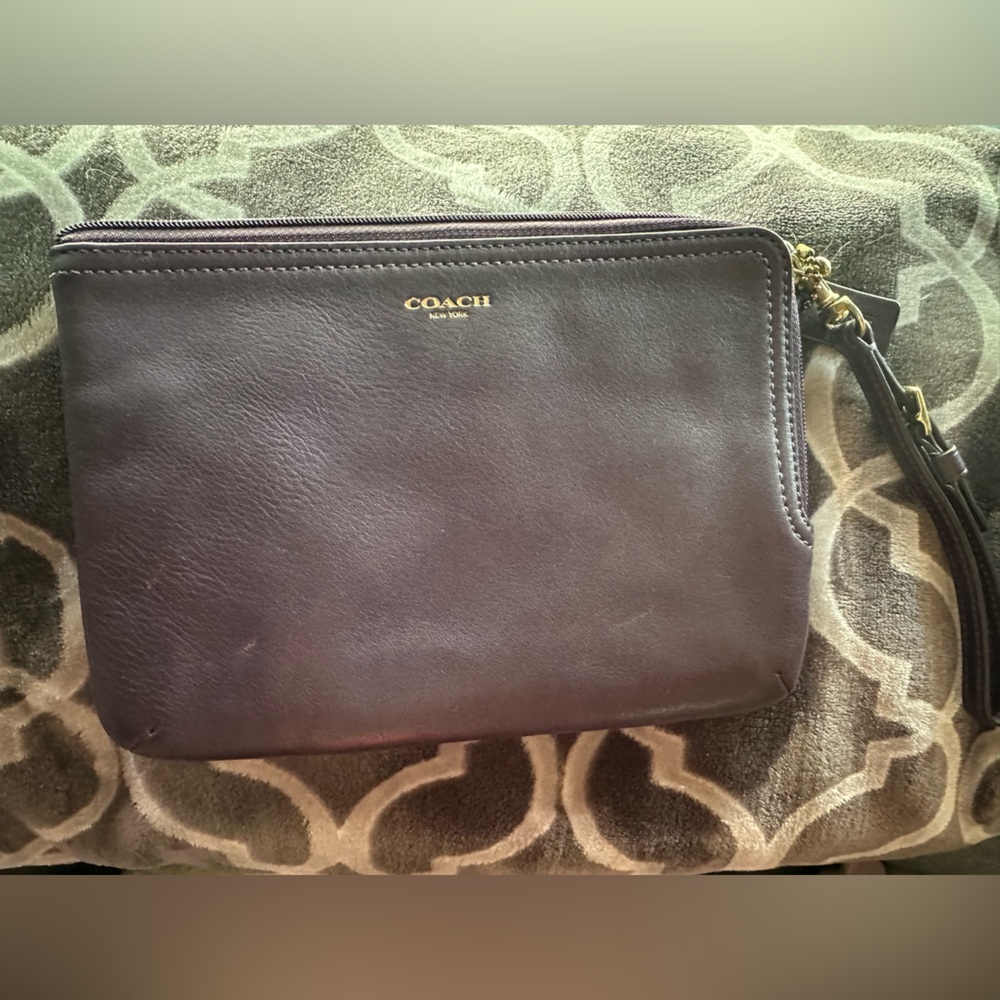 Coach wristlet in deep plum purple